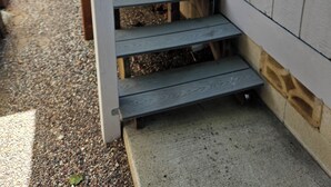 A wooden staircase leading to a house's entrance. -  Eastside Costa Mesa, close to Disneyland, beaches.
1.5 miles to JWA airport. (Costa Mesa)