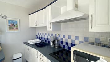 Microwave, oven, stovetop, coffee/tea maker