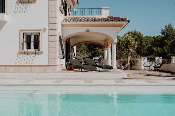 Just one of our many outdoor seating arrangements; enjoy peace and tranquility.