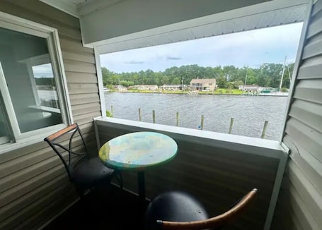 Outdoor dining. Knot Two- Balcony View of ICW- Dog Friendly