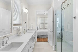 Combined shower/tub, hair dryer, towels, soap