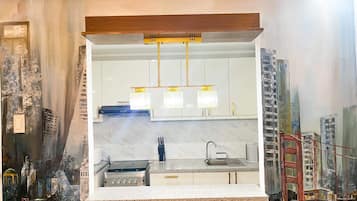 Refrigerador, microondas, horno y tetera eléctrica