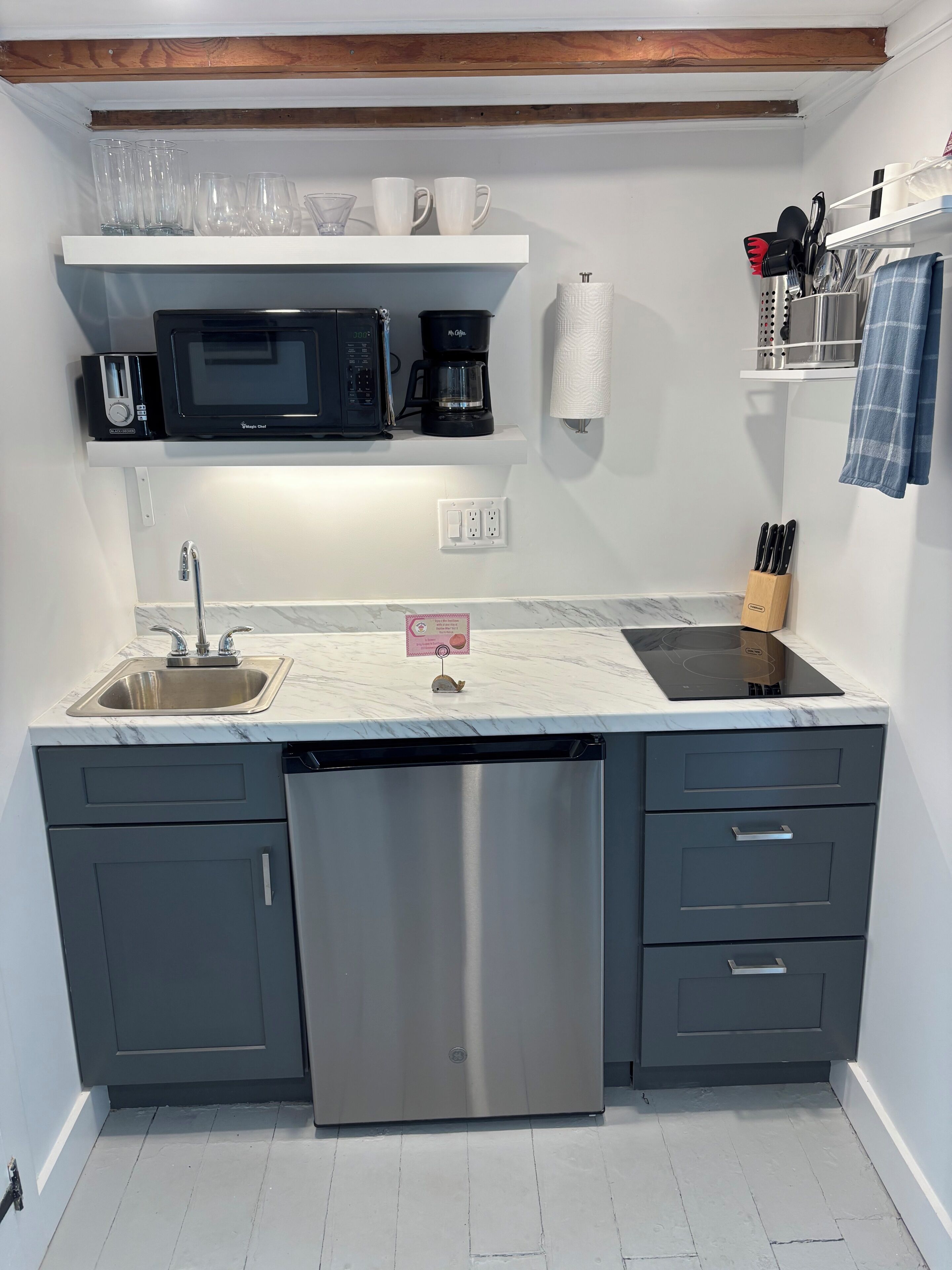 Fridge, microwave, coffee/tea maker, toaster