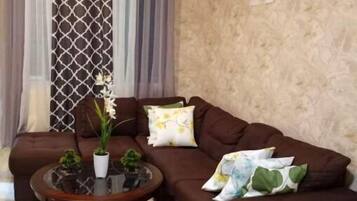 Una Smart TV, un reproductor estéreo