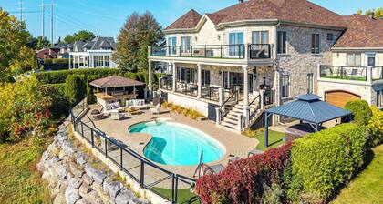 Resort-Like Amenities: Pool, Gym, Hot Tub, Front Water, Game Room, Cinema