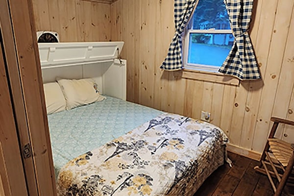 Bedroom includes queen foldaway bed