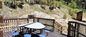 Geothermal pools and hot tub make this off-grid getaway pure joy!