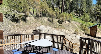Geothermal pools and hot tub make this off-grid getaway pure joy!