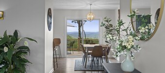 Great sunset view, hot tub, game room, big fire pit and new large fenced yard!