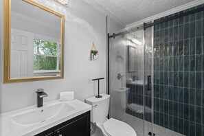 Shower, hair dryer, towels, soap