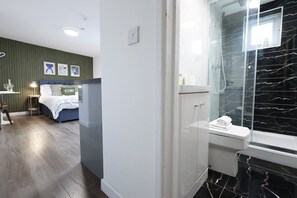 Shower, hair dryer, towels