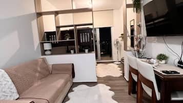 Luxury Studio Suite, 1 Bedroom, Balcony, City View | 1 bedroom, individually decorated, blackout curtains, iron/ironing board