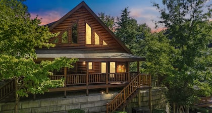 Your Getaway Oasis-Cozy 2bd/2bath cabin w/a creek, foosball, arcade, and hot tub