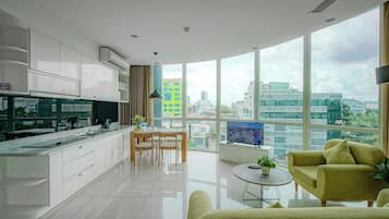 Apartamento panorâmico | Cozinha privada | Cooktop, chaleira elétrica, panela elétrica de arroz