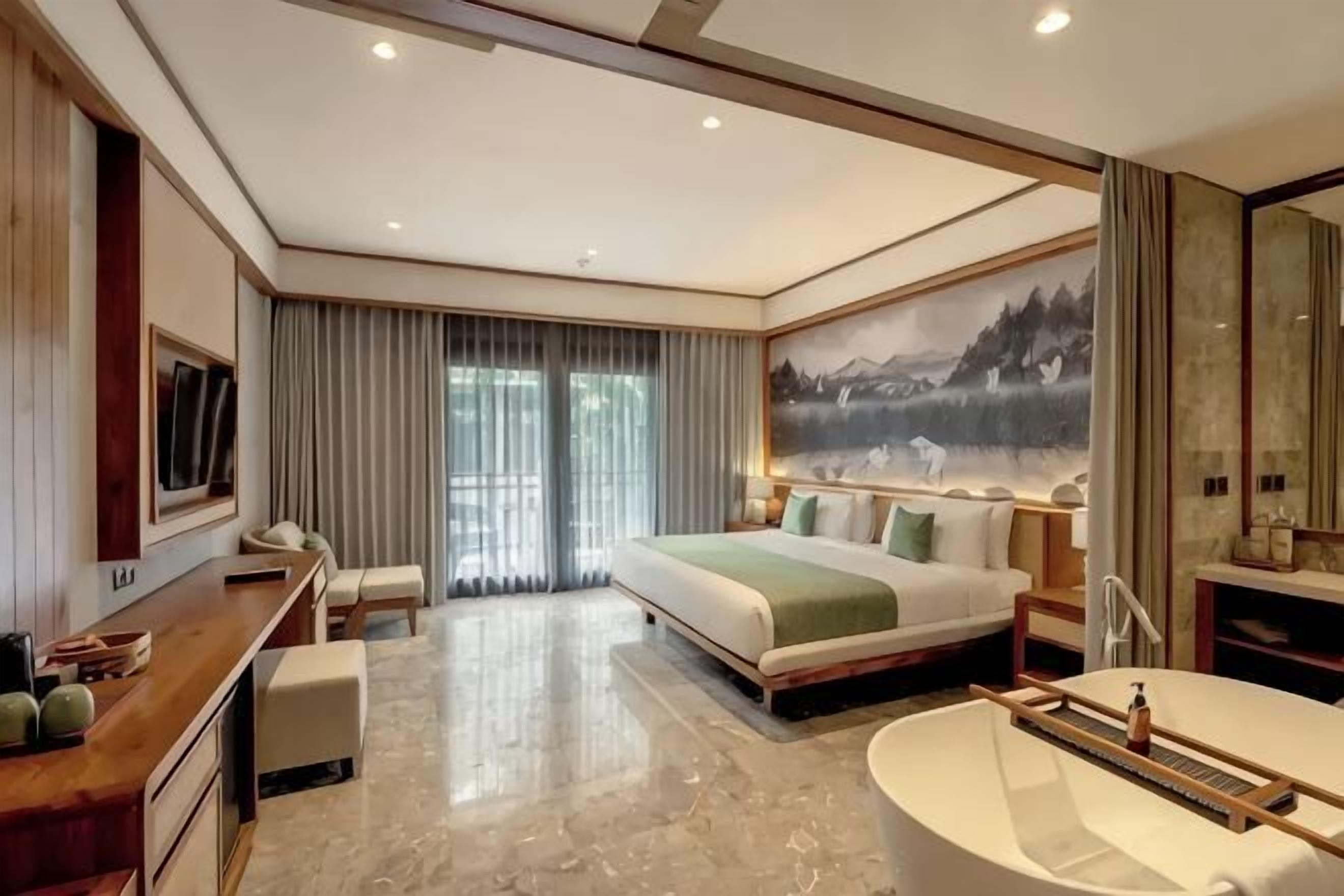Down comforters, pillowtop beds, free minibar, in-room safe