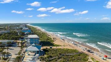 On the beach, sun loungers, beach towels