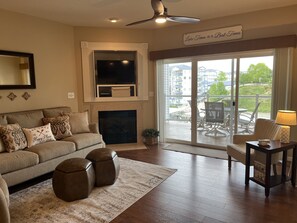 TV, fireplace - Luxury 2 Bed/2 Bath Lake Condo in Monarch Cove 2 MM, WALK-IN Unit w/ Boat Slip  (Lake Ozark)