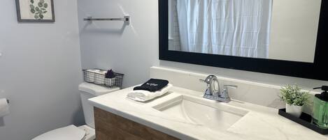 Shower, towels, soap, shampoo