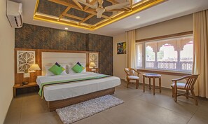 Standard Room With Mountain View | Blackout drapes, bed sheets - Treebo Haveli Resort Roots, Bhupatwala Haridwar (Haridwar)