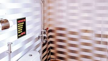Superior King Room With Balcony | Bathroom | Shower, rainfall showerhead, free toiletries, hair dryer