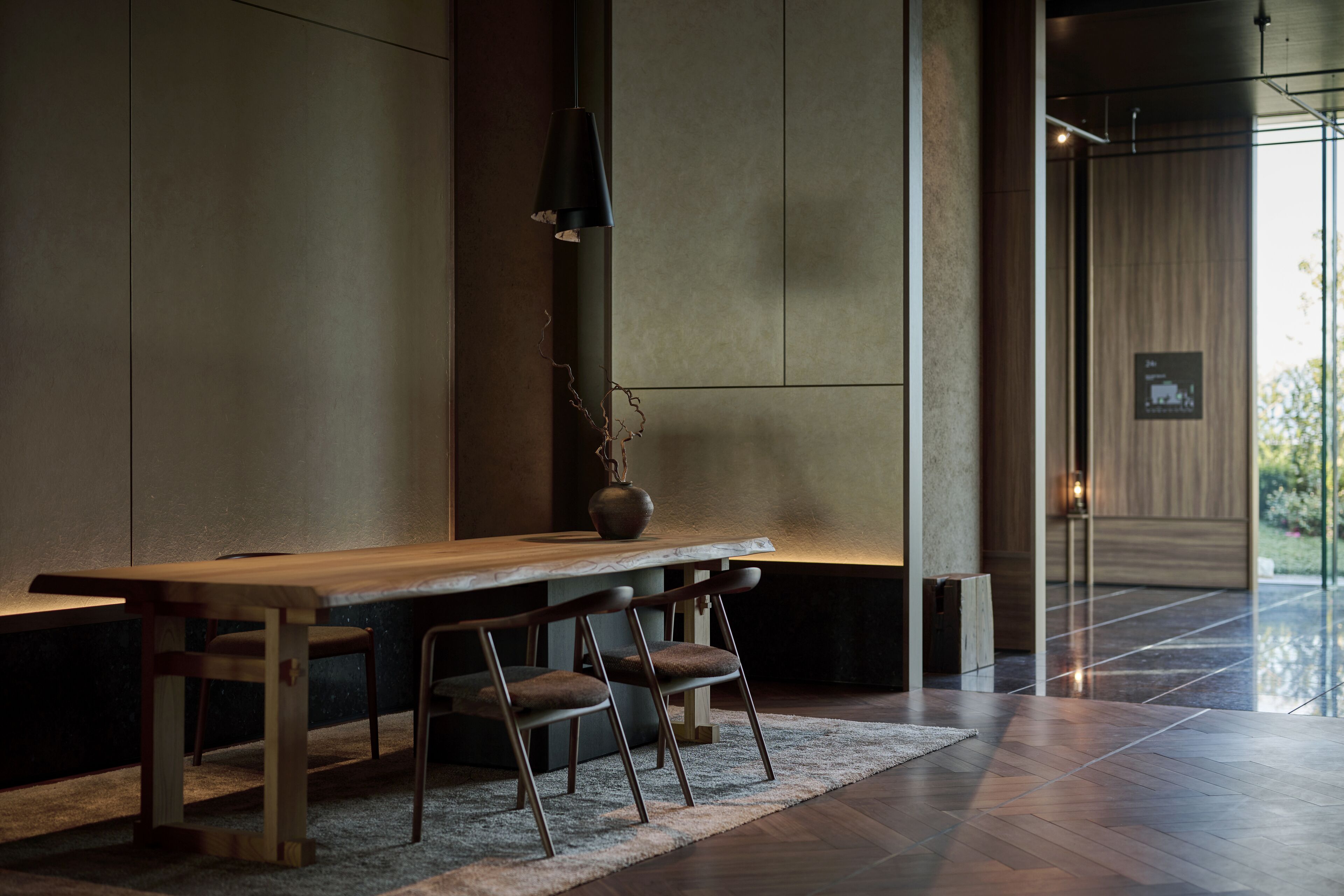 A modern interior with a wooden bench, chairs, and a vase.