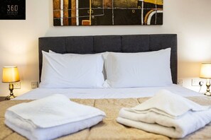 Desk, iron/ironing board, travel crib, free WiFi