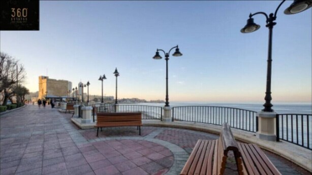 A waterfront promenade with benches and street lamps. - Designer, fully equipped APT, just off Tower Road (Tas-Sliema)