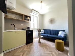 Apartamento, 1 quarto | Área de estar