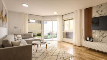 Apartment | Living area | 55-inch Smart TV with cable channels, TV