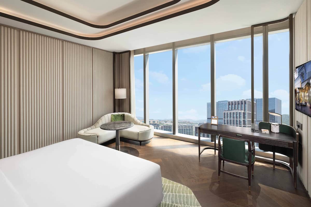 MGM Deluxe City View King | Premium bedding, down comforters, minibar, individually decorated