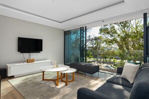 Appartement Classique | Coin séjour | Télévision à écran plat, services de streaming