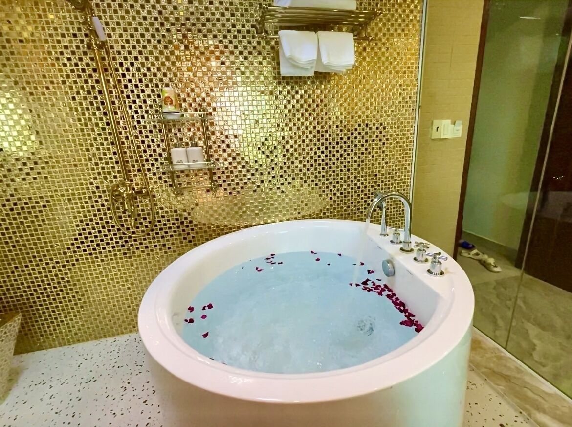 Design Double Room | Bathroom | Separate tub and shower, hydromassage showerhead, designer toiletries