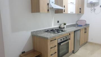 Oven, stovetop, dining tables