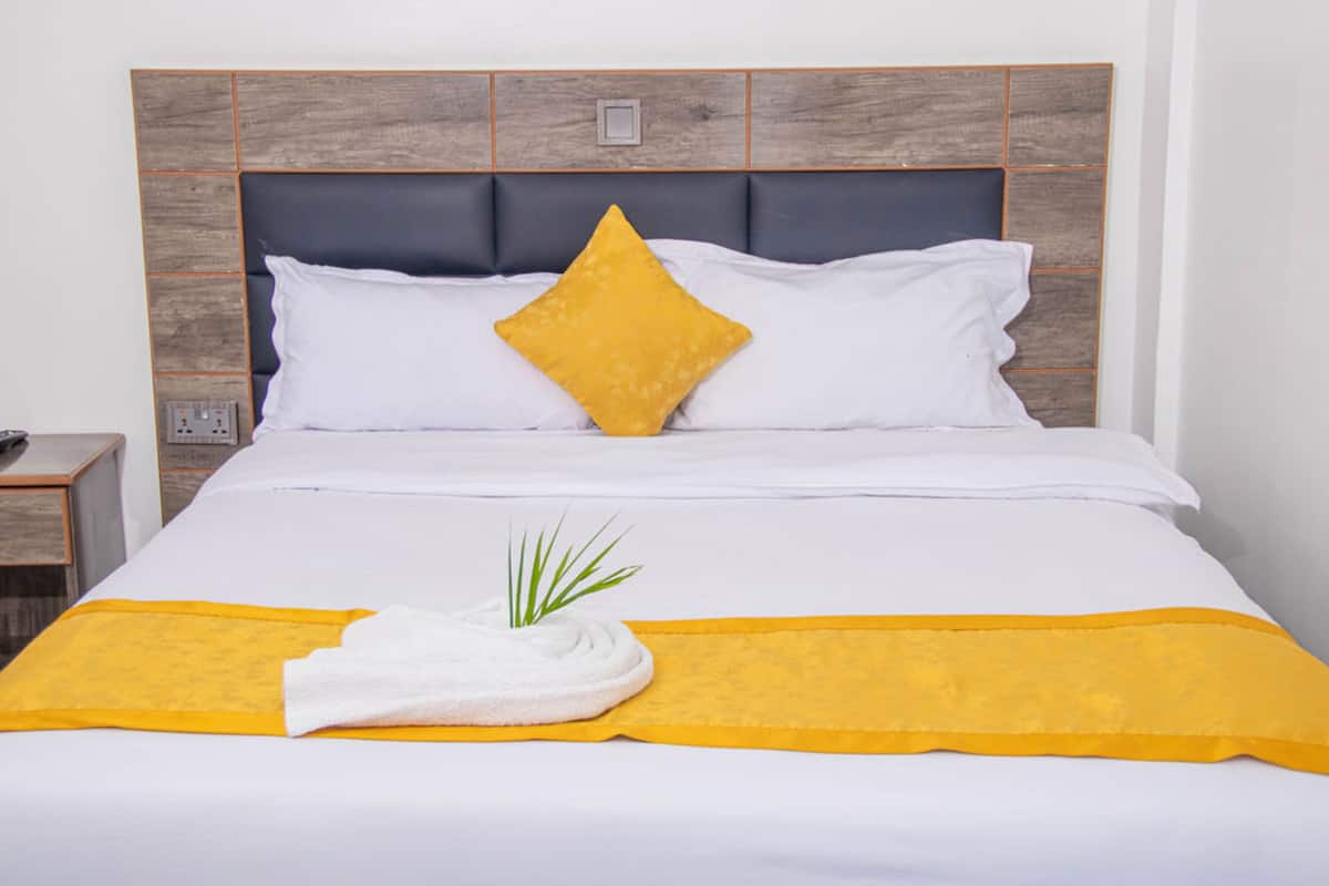 Desk, laptop workspace, free WiFi, bed sheets