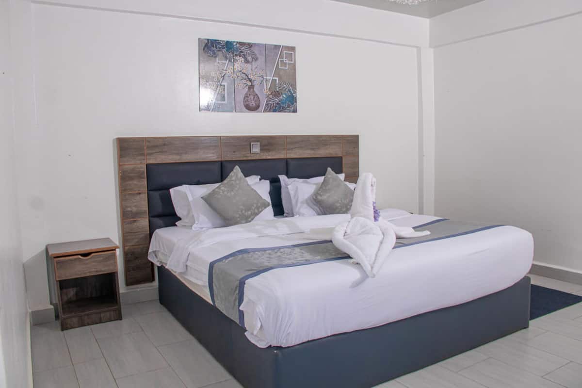 Desk, laptop workspace, free WiFi, bed sheets