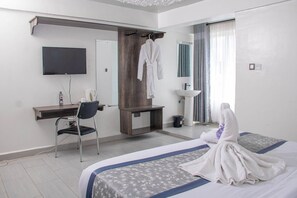 Kamar Single Deluks | Meja kerja, ruang kerja ramah laptop, Wi-Fi gratis, dan seprai linen