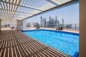Outdoor pool - Tanin - Luxurious and Contemporary Studio in JLT Cluster R (Dubai)