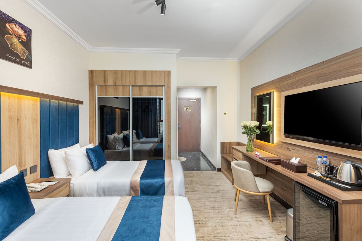 1 غرفة نوم وميني بار وخزنة داخل الغرفة وطراز فريد لكل وحدة