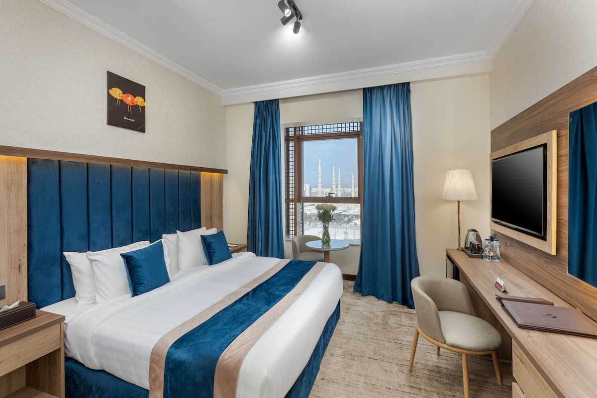 1 غرفة نوم وميني بار وخزنة داخل الغرفة وطراز فريد لكل وحدة