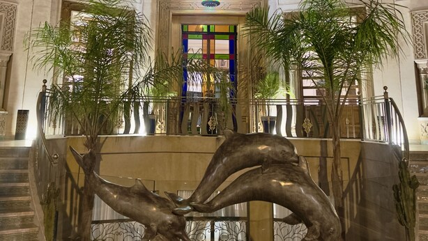 A grand entrance with a central staircase, ornate railings, and a large decorative fountain. - Sillage Palace Sky & Spa  (Marrakech)
