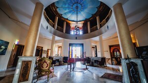 A grand lobby with a circular ceiling, marble floors, and classical columns. - Sillage Palace Sky & Spa  (Marrakech)
