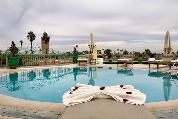 Indoor pool, outdoor pool, pool umbrellas, pool loungers