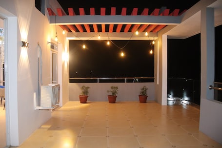 Family Apartment, Kitchen, Partial Sea View | Terrace/patio