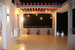 Family Apartment, Kitchen, Partial Sea View | Terrace/patio