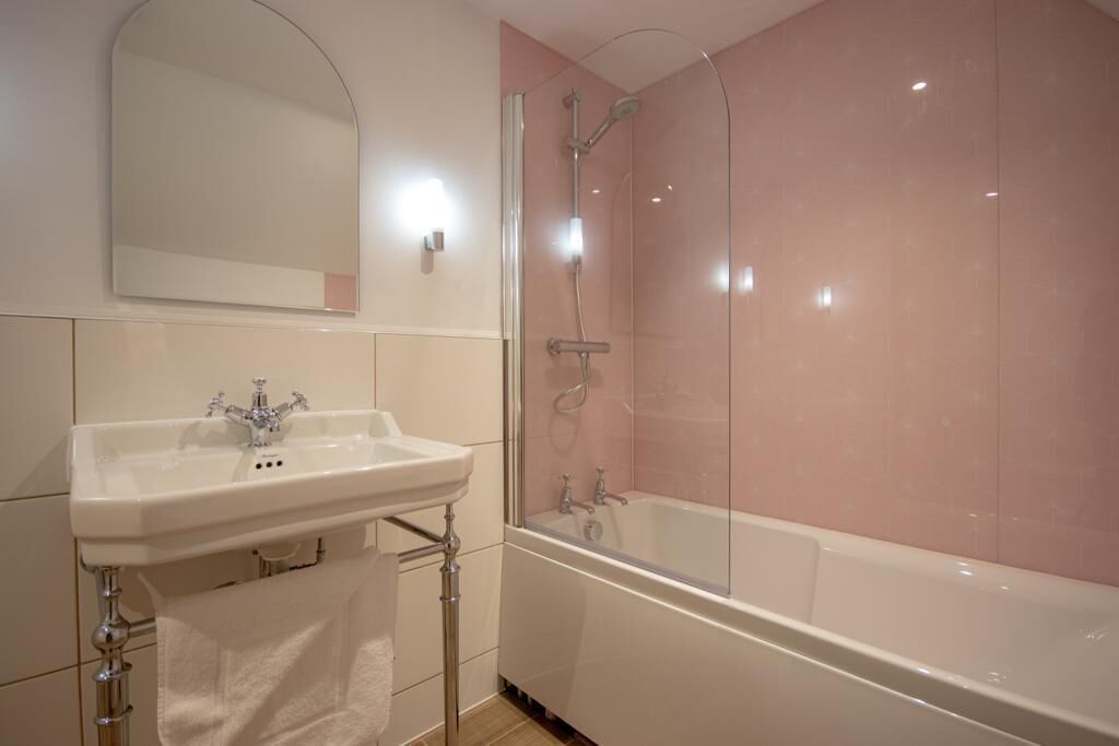Shower, towels, soap, toilet paper
