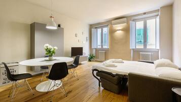 Comfort Apartment | Living area | 40-inch flat-screen TV with digital channels, TV