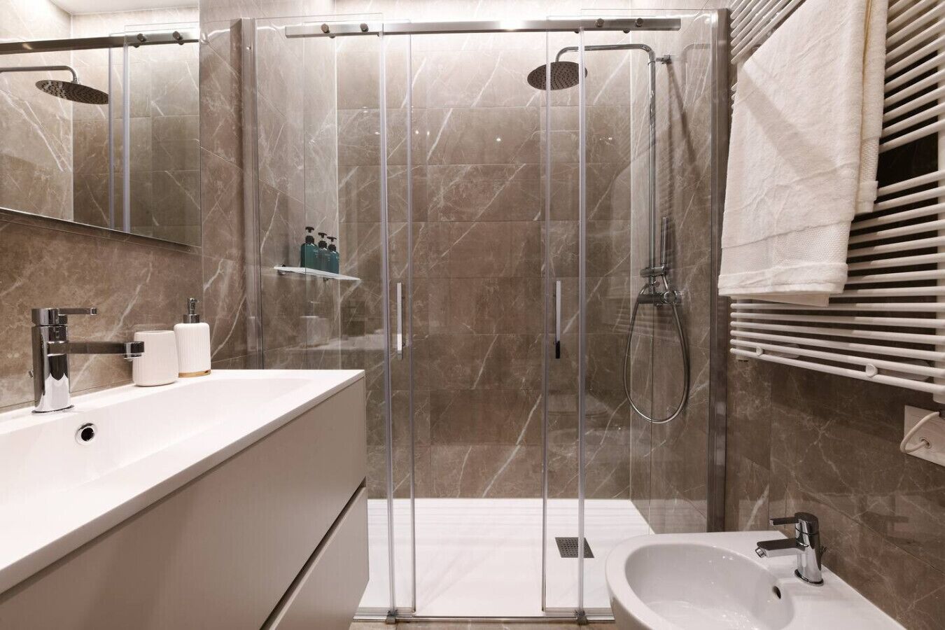 Hair dryer, towels, soap, shampoo