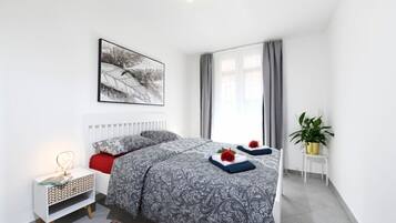 2 bedrooms, desk, iron/ironing board, travel crib
