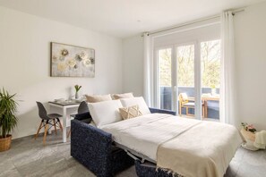 1 bedroom, desk, iron/ironing board, travel cot