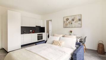 1 bedroom, desk, iron/ironing board, travel crib